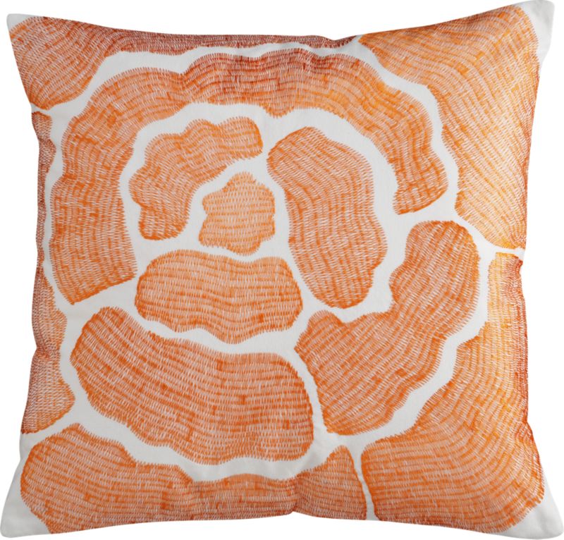 Flower power. Abstract rose blooms large in satiny orange machine stitch on all-white all-cotton square. Hidden zipper; feather-down insert included. Machine wash. Imported.
	Orange embroidered flow from cb2.com