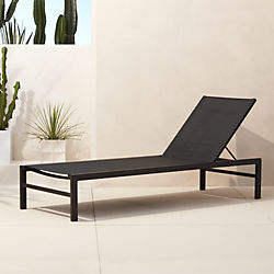 idle black outdoor chaise lounge