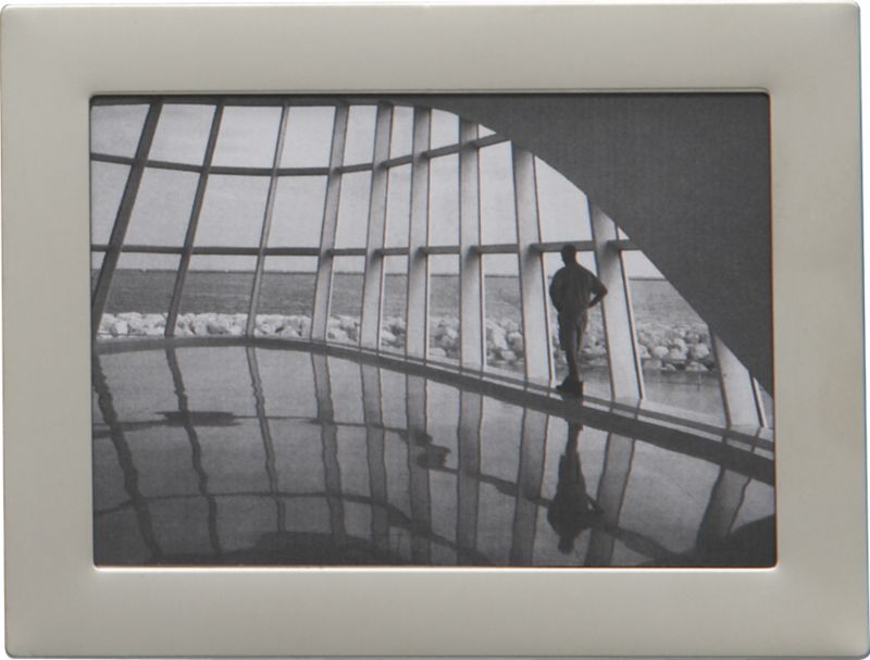 small frame. 3.5"Wx2.5"H (holds one 2.5"x3.5" photo).