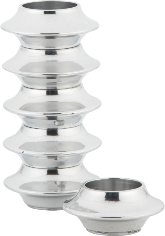 set of six nara stacking candleholders. 3"dia.x7"H stacked; 3"dia.x1.25"H each.