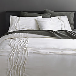 twisted white bed linens