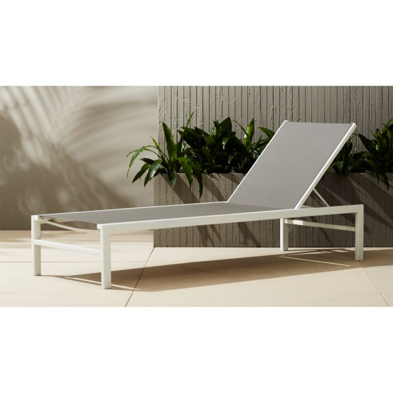 idle grey outdoor chaise lounge | CB2