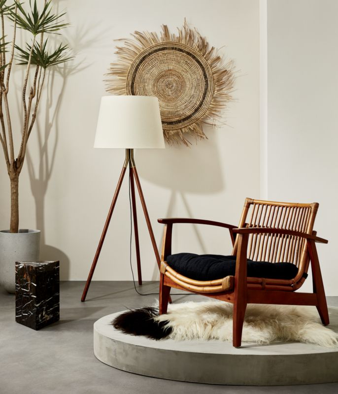 CB2 April Catalog 2019 Noelie Rattan Lounge Chair with Cushion