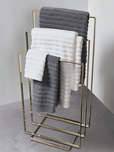 https://images.cb2.com/is/image/CB2/cb2_blog_bath-storage_towel-bars